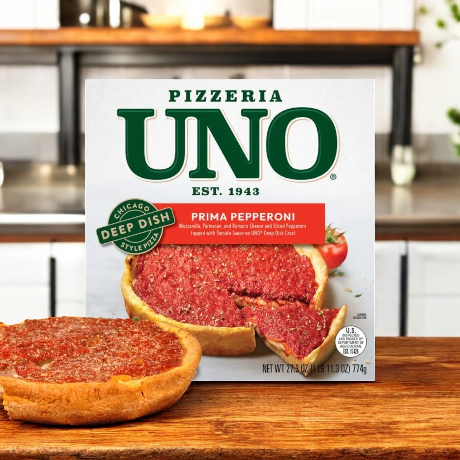 A 9-inch Pizzeria Uno Chicago Style Deep Dish Prima Pepperoni Pizza, with a thick crust and rich tomato sauce, sits partially sliced on a wooden surface, showcasing its tempting layers. Package: 27.3 oz - 1 Box.