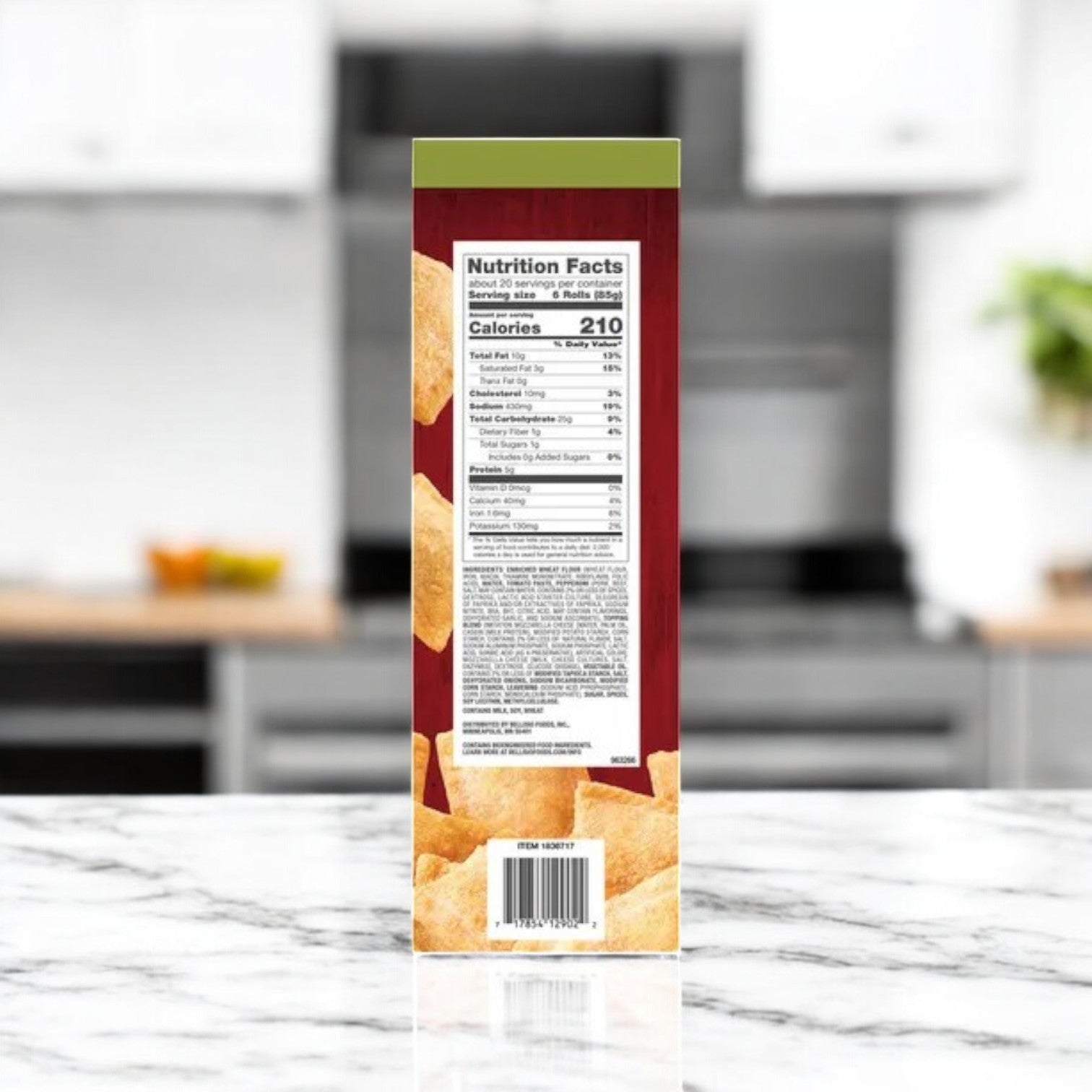 A box of Bellisio Foods Pizza Snack Rolls, 60 Oz - 1 Pack displaying nutrition facts rests on a marble countertop with a blurred kitchen background.