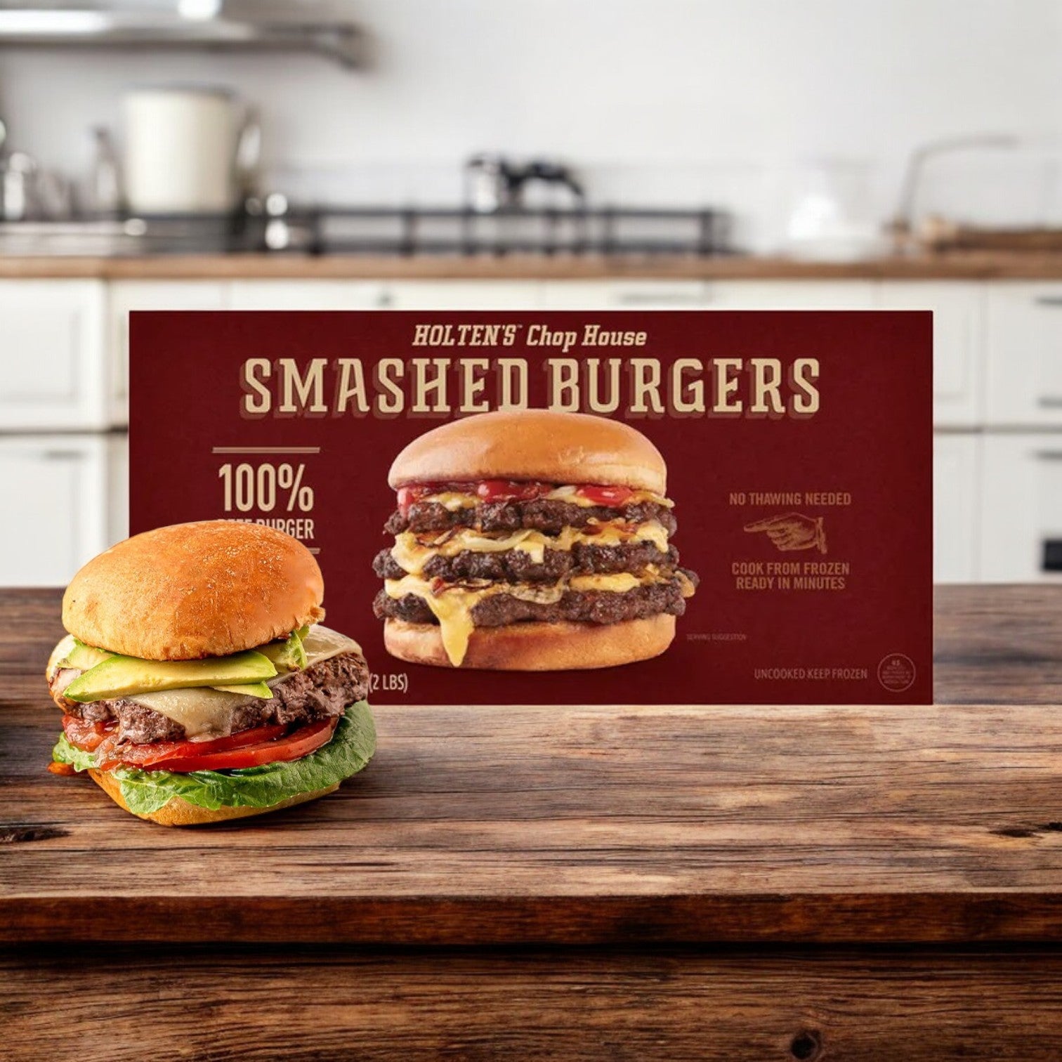 A box of Holton's Chop House Steak Burgers Certified Angus Beef-1 Count rests on the kitchen countertop beside an unpackaged patty, ready for grilling.