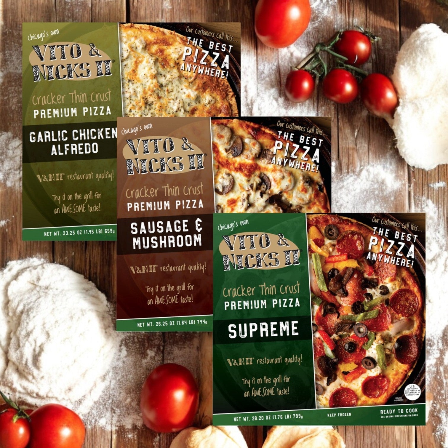 Four packs of Vito & Nick's 3-Pizza Combo sit on a wooden surface surrounded by tomatoes and flour. Enjoy true Chicago tavern-style pizza with our cracker-thin crust perfection in these Garlic Chicken Alfredo, Sausage & Mushroom, and Supreme flavors.