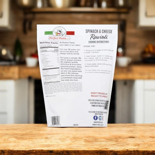 A pack of Perfect Pasta Ravioli, Spinach & Cheese rests on a wooden table in a cozy kitchen, displaying easy cooking instructions and essential nutrition facts for this Italian-inspired treat.