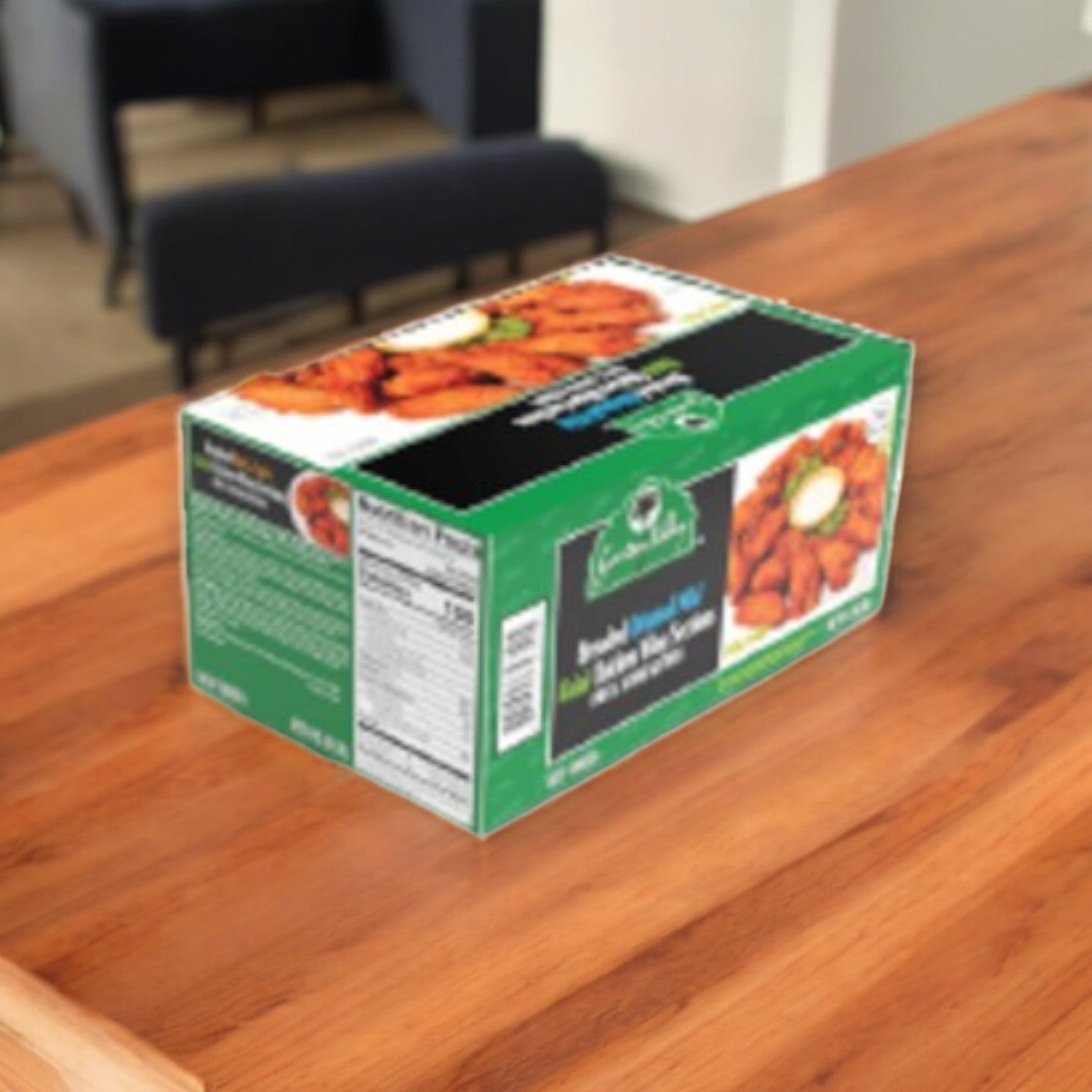 A 10 lb box of Garden Valley Breaded Original Mild Halal Chicken Wings, fully cooked, sits on a wooden table. The green packaging displays the wings, promising a deliciously crunchy experience.