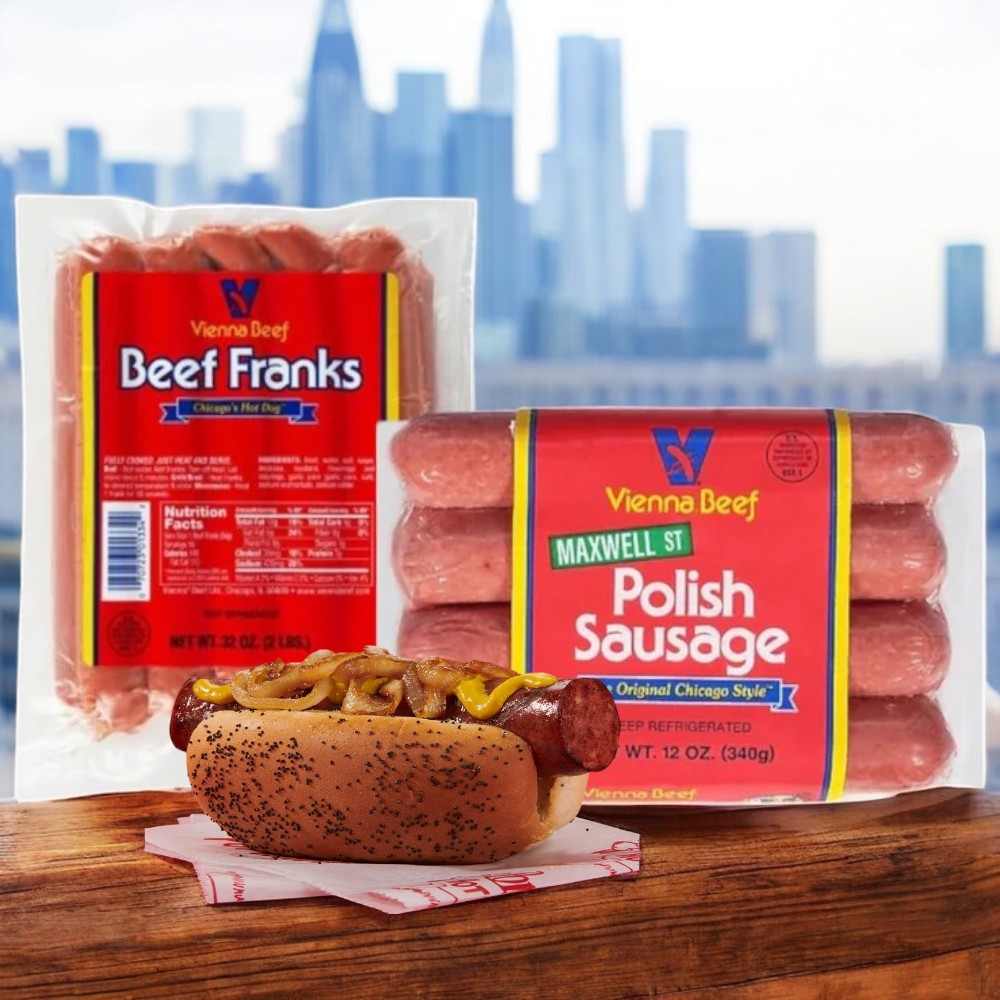 In the foreground, enjoy a classic Chicago-style hot dog with mustard on a poppy seed bun made from Vienna Beef's 2-Pack Combo, featuring 16 Beef Franks and 8 Maxwell St. Polish Sausages. The city skyline is in the background.