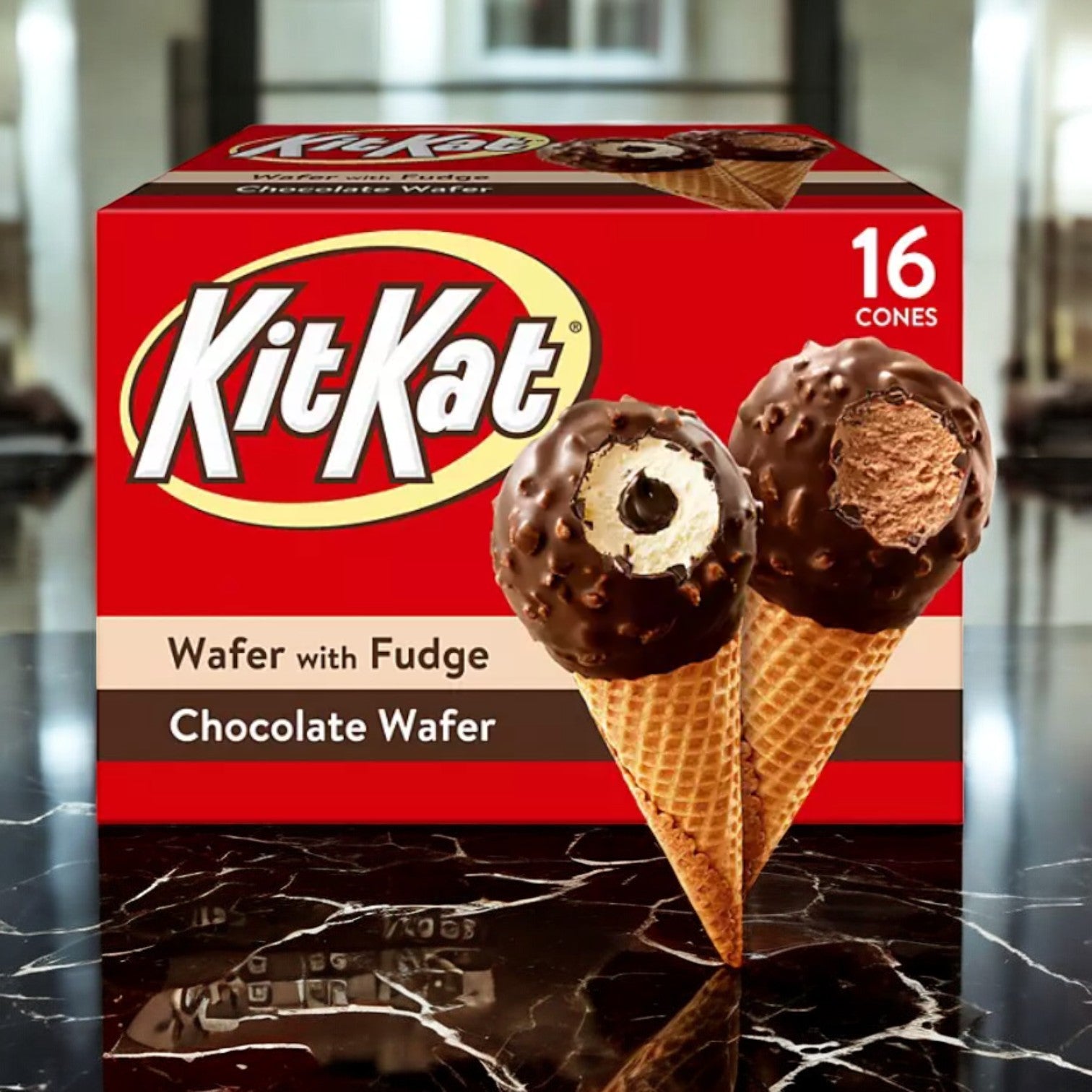 The image shows a box of Nestle's Kit Kat Drumstick Ice Cream Cones Variety Pack, featuring flavors like "Wafer with Fudge" and "Chocolate Wafer." This delightful assortment contains 16 cones, ideal for any ice cream enthusiast.