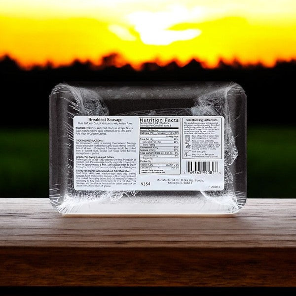 Ditka's Breakfast Sausage by Vienna Beef (16 oz.) sits on wood, its detailed labels shining against a sunset, evoking a premium pork dish from a restaurant-style breakfast menu.