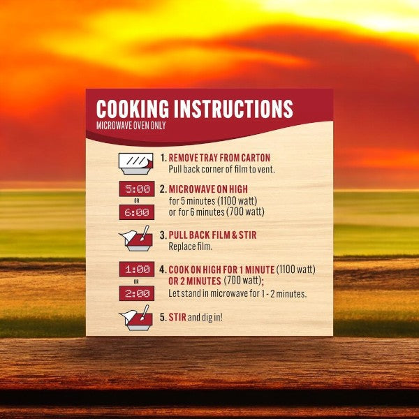 Enjoy the simplicity of preparing Smart Ones Chicken Parmesan with Spaghetti. Just remove the tray, microwave, pull back the film to stir, cook further, then stir again for a perfect bite every time against a rustic wood and sunset sky backdrop.