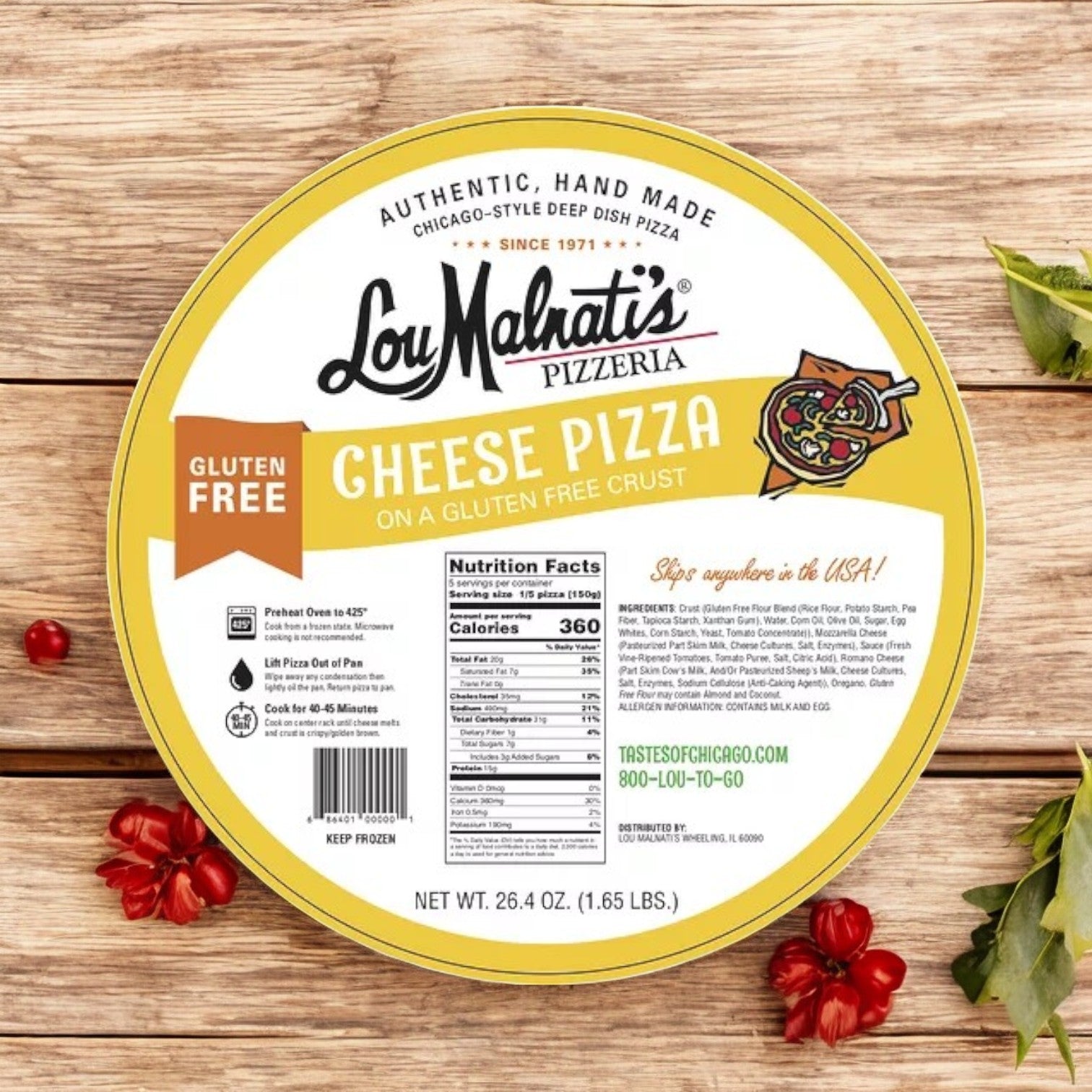 Lou Malnati's Gluten Free Crust Combo Pack with 3 pizzas rests on a wooden surface decorated with scattered red berries and leaves.