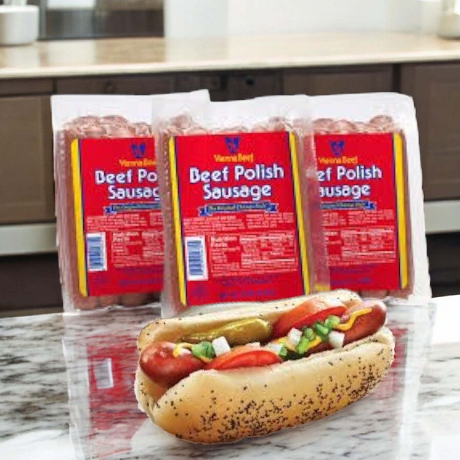 Behind, three 32 oz packages of Vienna Beef Polish Sausage are displayed, while in the foreground a hot dog with garnishes rests on a marble countertop.