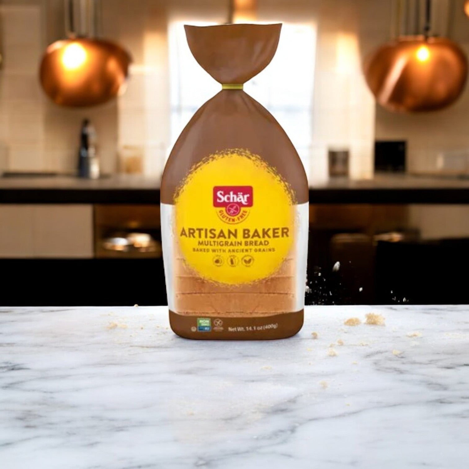 A package of Schar Artisan Baker Multigrain Bread-1 Count sits on a marble kitchen countertop.