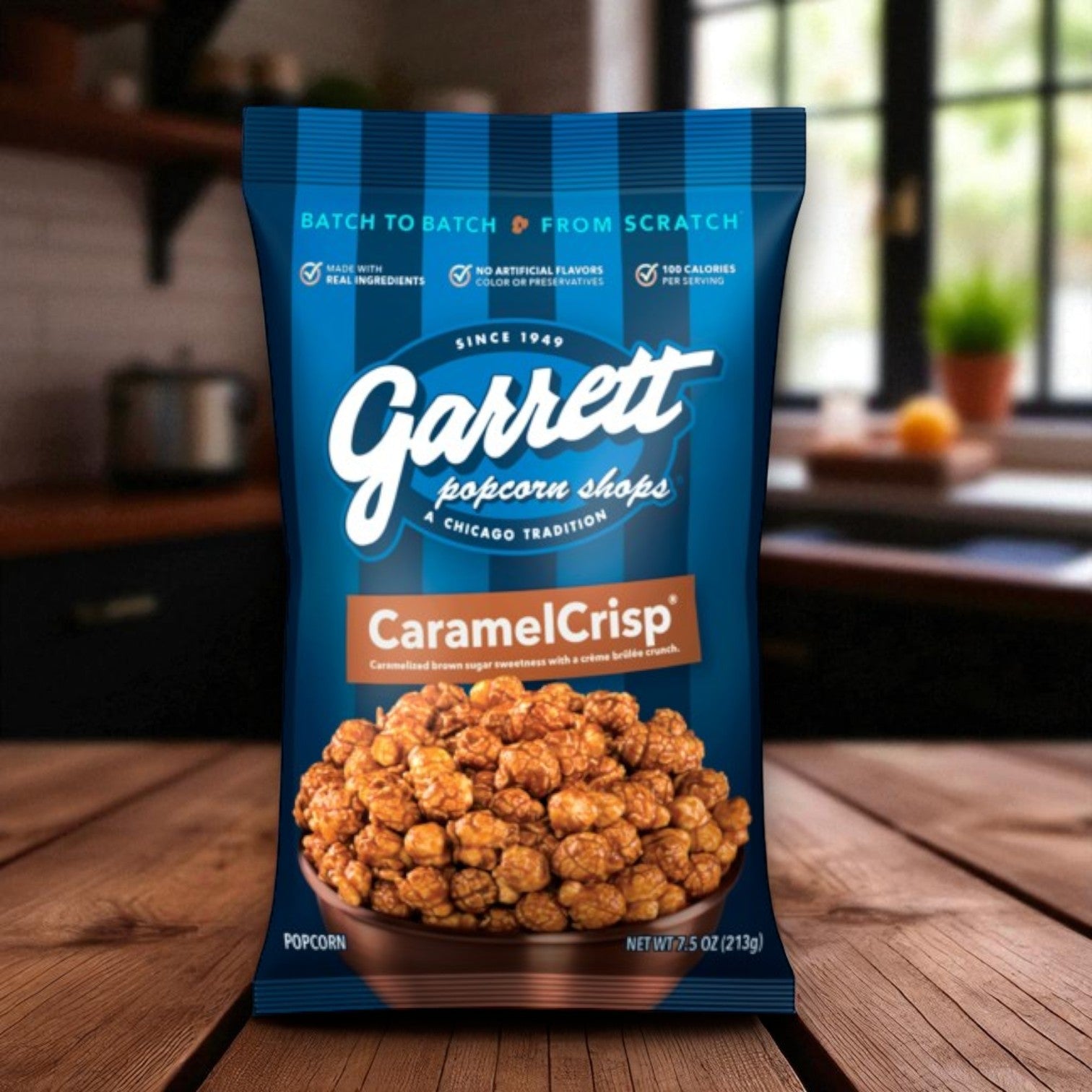 A bag of Garrett’s Portillo's Famous Chocolate Cake & Garrett Popcorn CaramelCrisp – Sweet Chicago Duo rests on a wooden surface in a cozy kitchen.