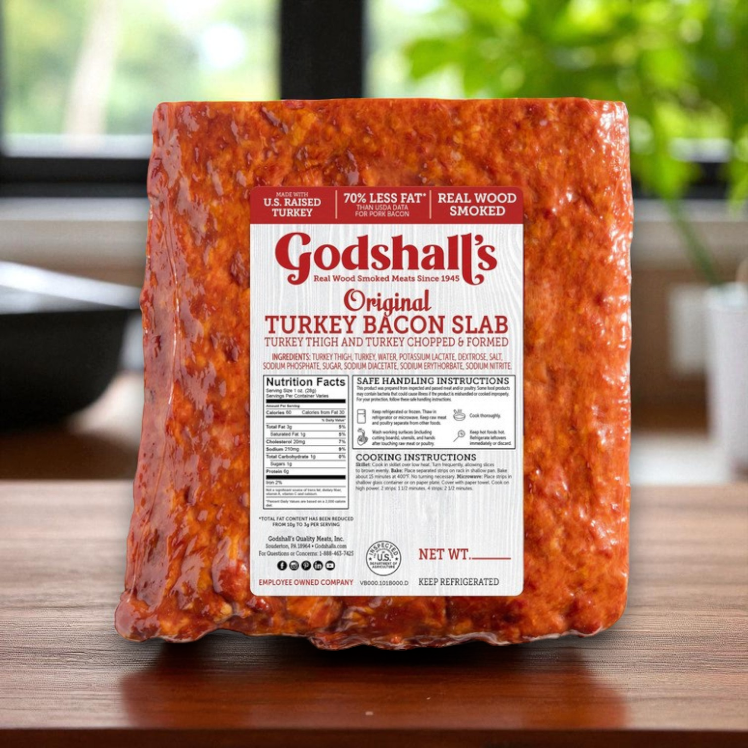 A 3-pack of Godshall’s Turkey Bacon Slab (approx. 6 lbs total each) with clear nutrition labels and packaging sits on a wooden surface, highlighting the quality of this premium Godshall's product.