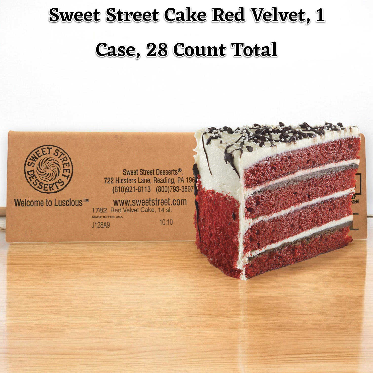 A gourmet red velvet cake slice with cream cheese frosting and chocolate shavings is pictured in front of a Sweet Street cardboard box, labeled "Sweet Street Cake Red Velvet, 1 Case, 28 Count Total.