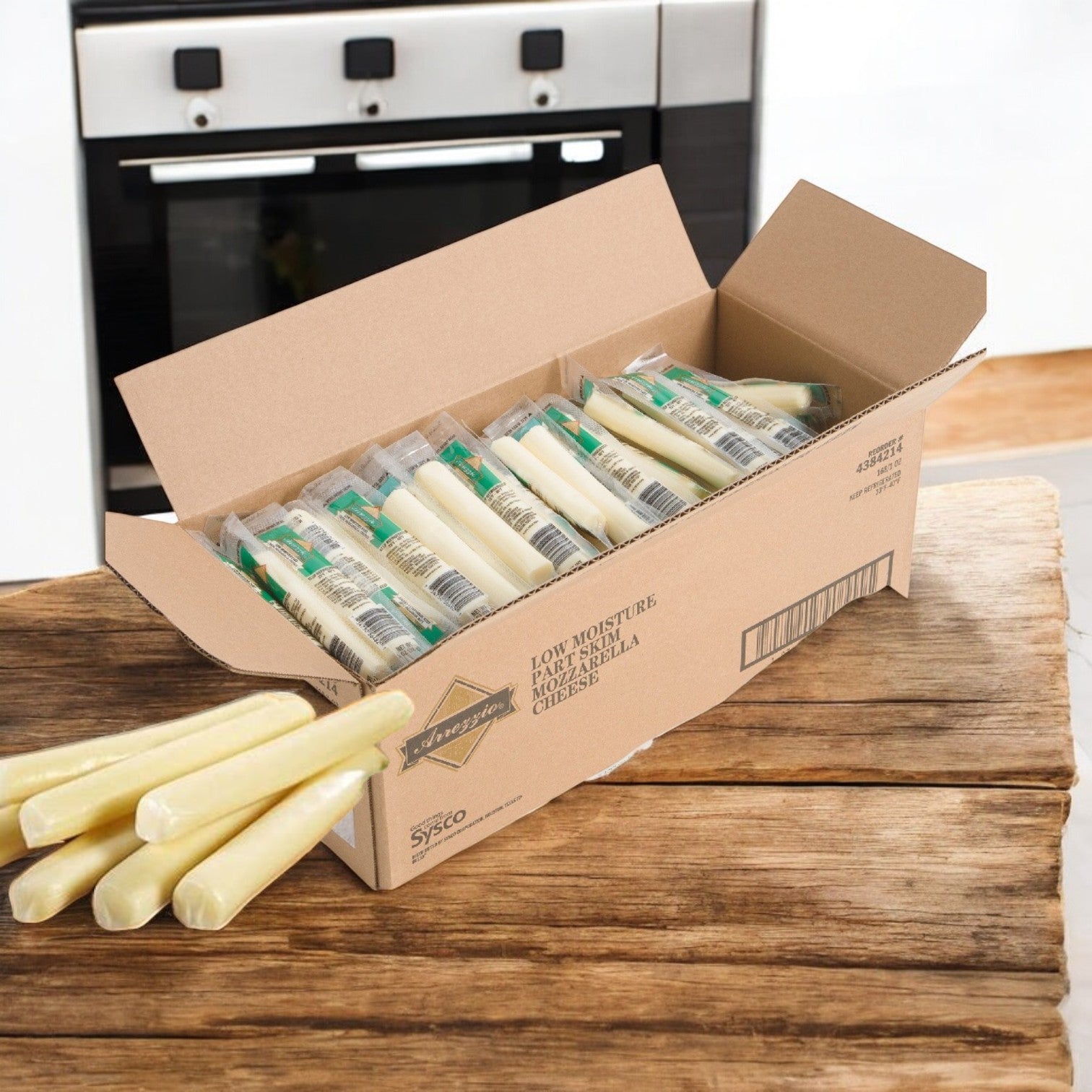 On a wooden table sits an open case of Sysco's Arrezzio Imperial Cheese Mozzarella String, each 1 oz. piece individually wrapped. This high-protein snack adds convenience and flavor, with an oven in the background hinting at culinary possibilities.