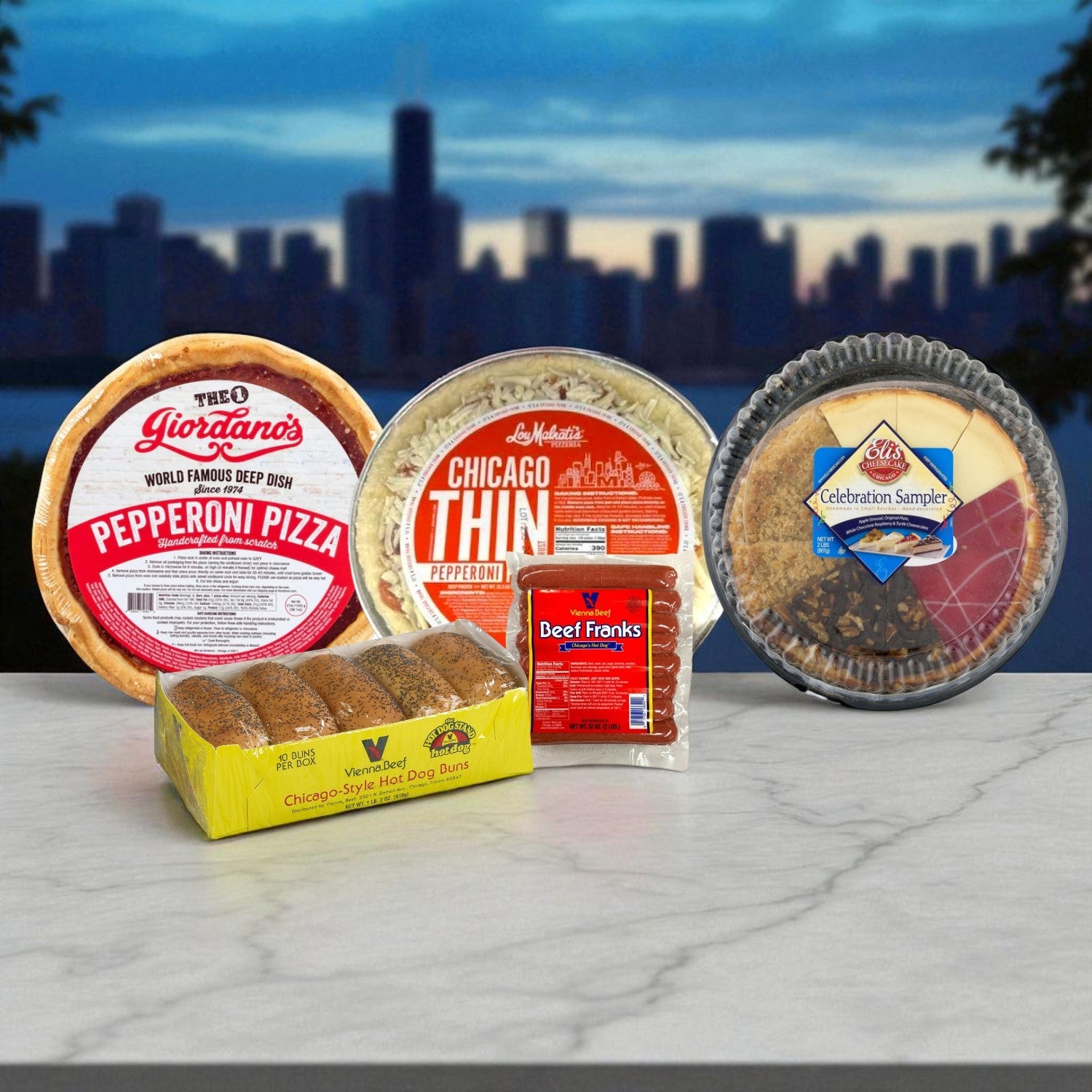 Chicago’s Food Box- 2 Pizzas, Hot Dogs, Buns and Cheese Cake Sampler!