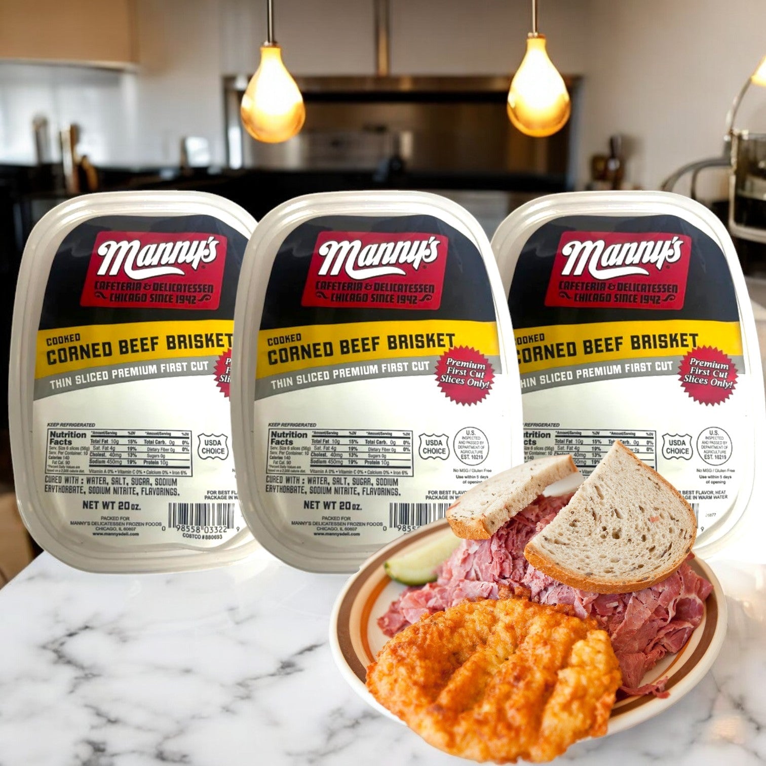 Three packages of Manny's Cooked Corned Beef Brisket sit on a kitchen counter with a sandwich and crispy onion rings, their aroma enhanced by a traditional spice blend.