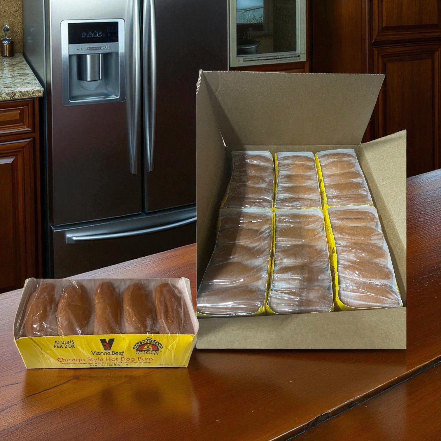 A package of Vienna Beef Plain Hot Dog Buns (12/10 count pack case, 120 per case) sits on the counter next to an open box containing more sealed Vienna Beef hot dog buns.