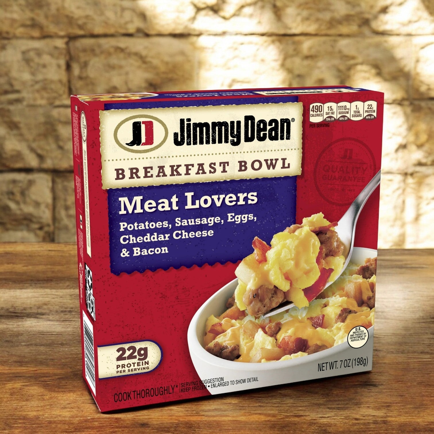 A box of Jimmy Dean Breakfast Bowl, Meat Lovers, features protein-rich potatoes, sausage, eggs, cheddar cheese, and bacon. Nutrition facts are on the top right corner. Each bowl weighs 7 oz (198g). Available in an 8 count pack from Jimmy Dean.