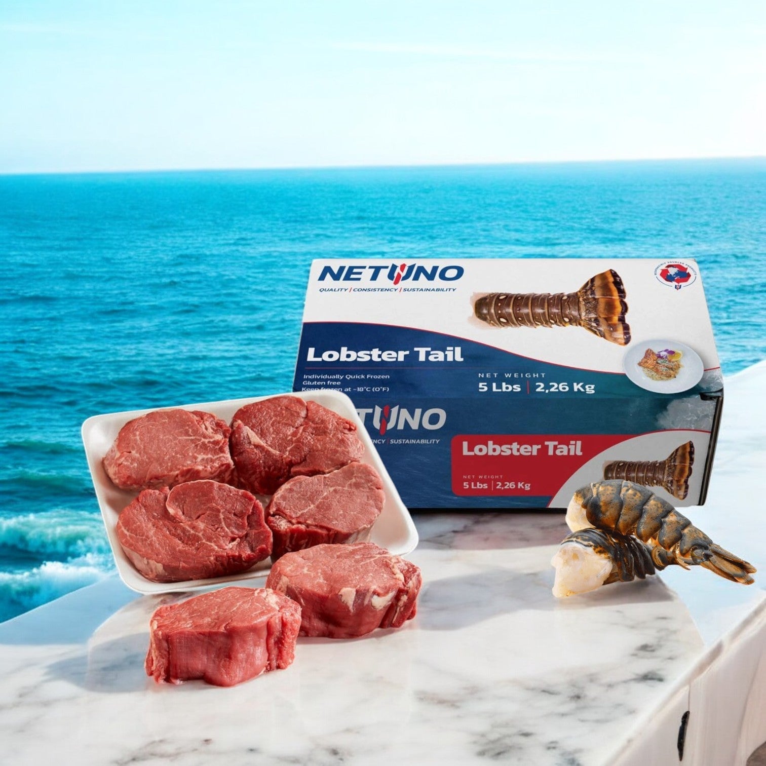 A table is set with Easy Lunches' "Surf and Turf!" featuring USDA Choice Beef Loin Tenderloin Steak - Filet Mignon and 5 pounds of frozen Netuno Lobster Tails, crafting the perfect ocean-view dining scene.