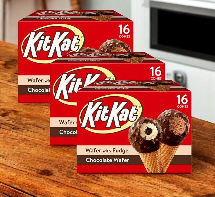 Three boxes of Nestle's Kit Kat Drumstick Ice Cream Cones Variety Pack, each box containing 16 cones, are displayed on a wooden surface, offering a delightful twist on the classic treat.