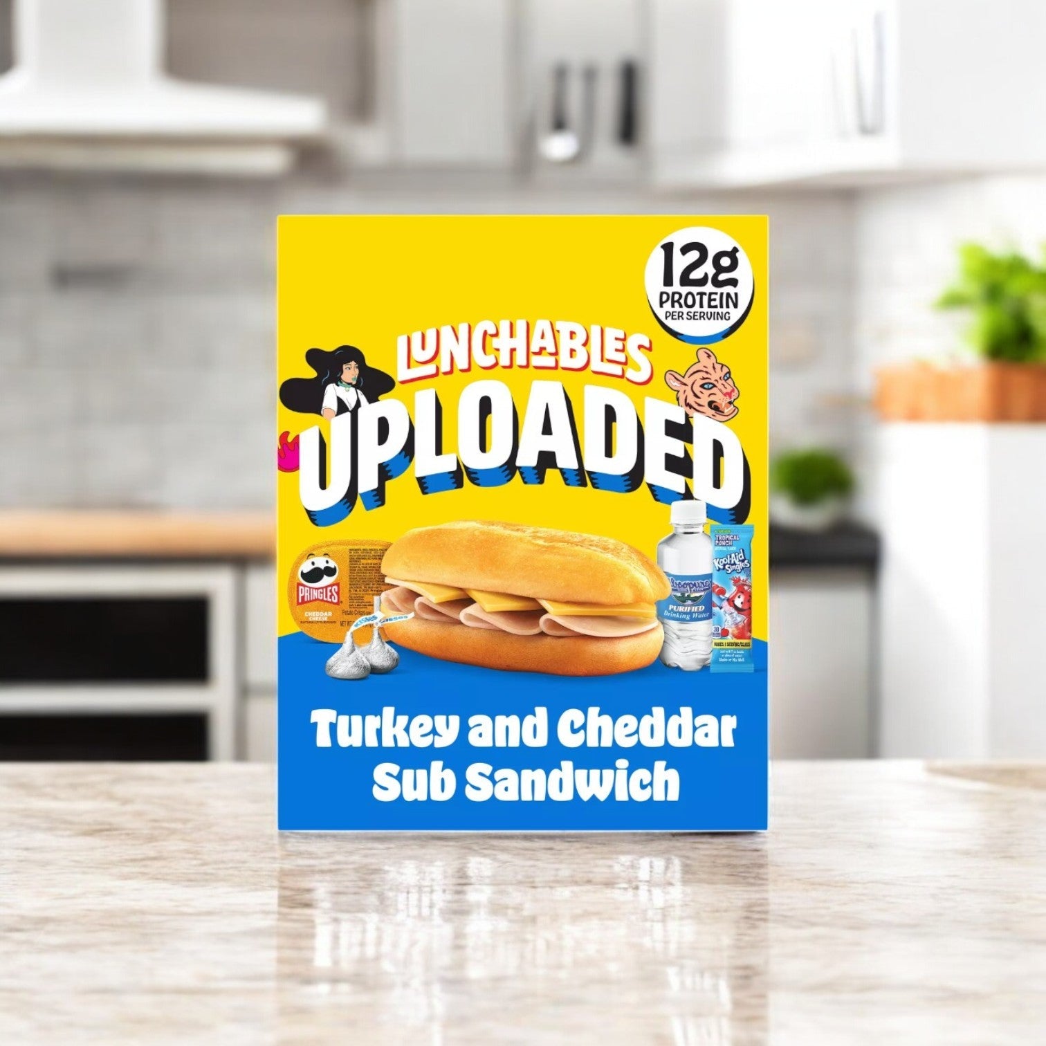The Lunchables 6-Inch Turkey & Cheddar Cheese Sub Sandwich sits conveniently on the kitchen counter, perfect for on-the-go meals. This snack offers 12g of protein per 15 oz serving, ensuring a tasty and satisfying option for busy lifestyles.
