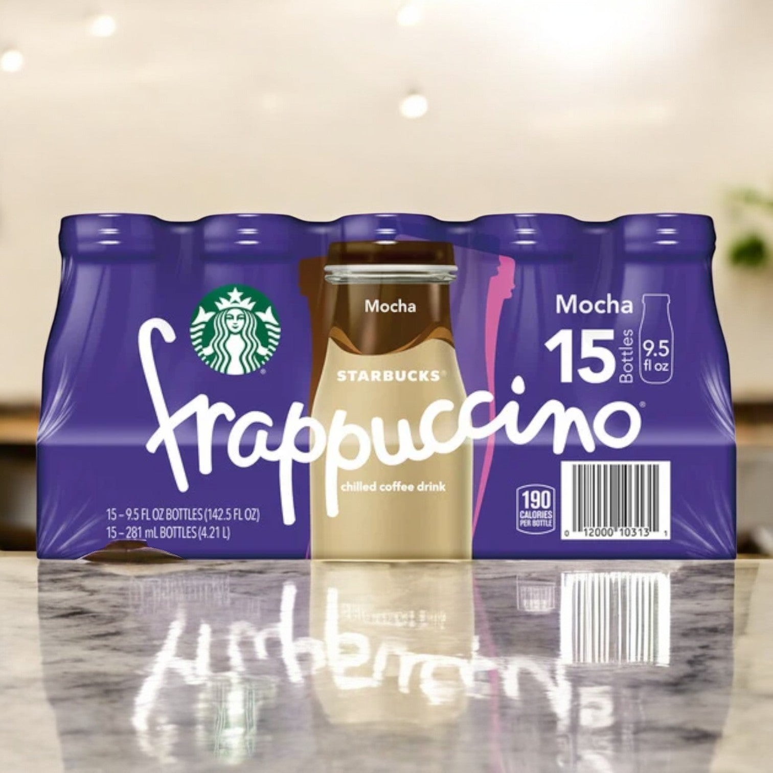 A pack of fifteen 9.5 fl oz Starbucks Frappuccino Mocha bottles, encased in a purple and white cardboard carrier on a reflective surface, provides a refreshing ready-to-drink chilled coffee experience any time of day.