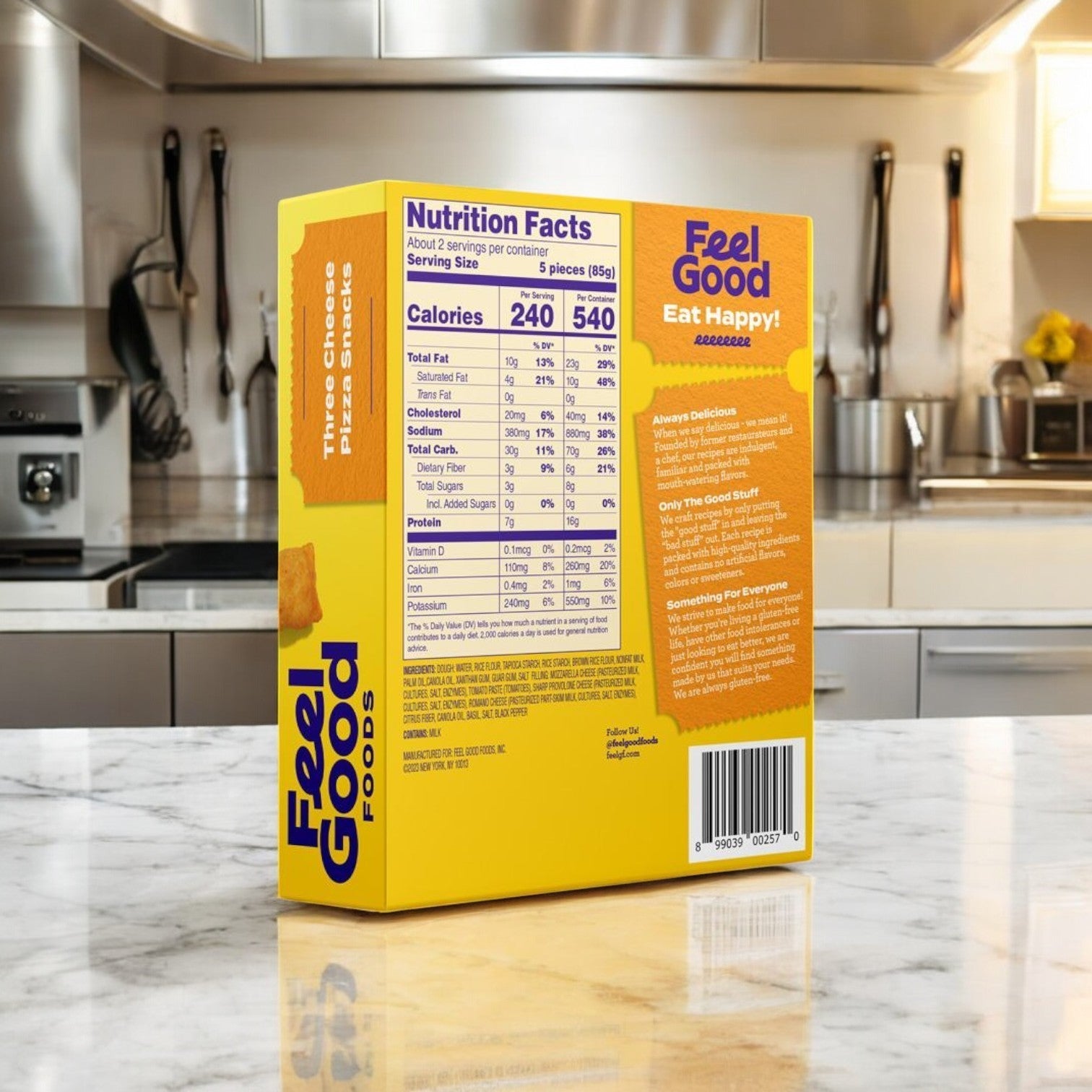 On a kitchen counter, the back of a Feel Good Foods mac and cheese box displays nutrition facts, ingredients, and cooking instructions. Pair perfectly with Feel Good Foods Three Cheese Pizza Snacks or savor alone for comfort.