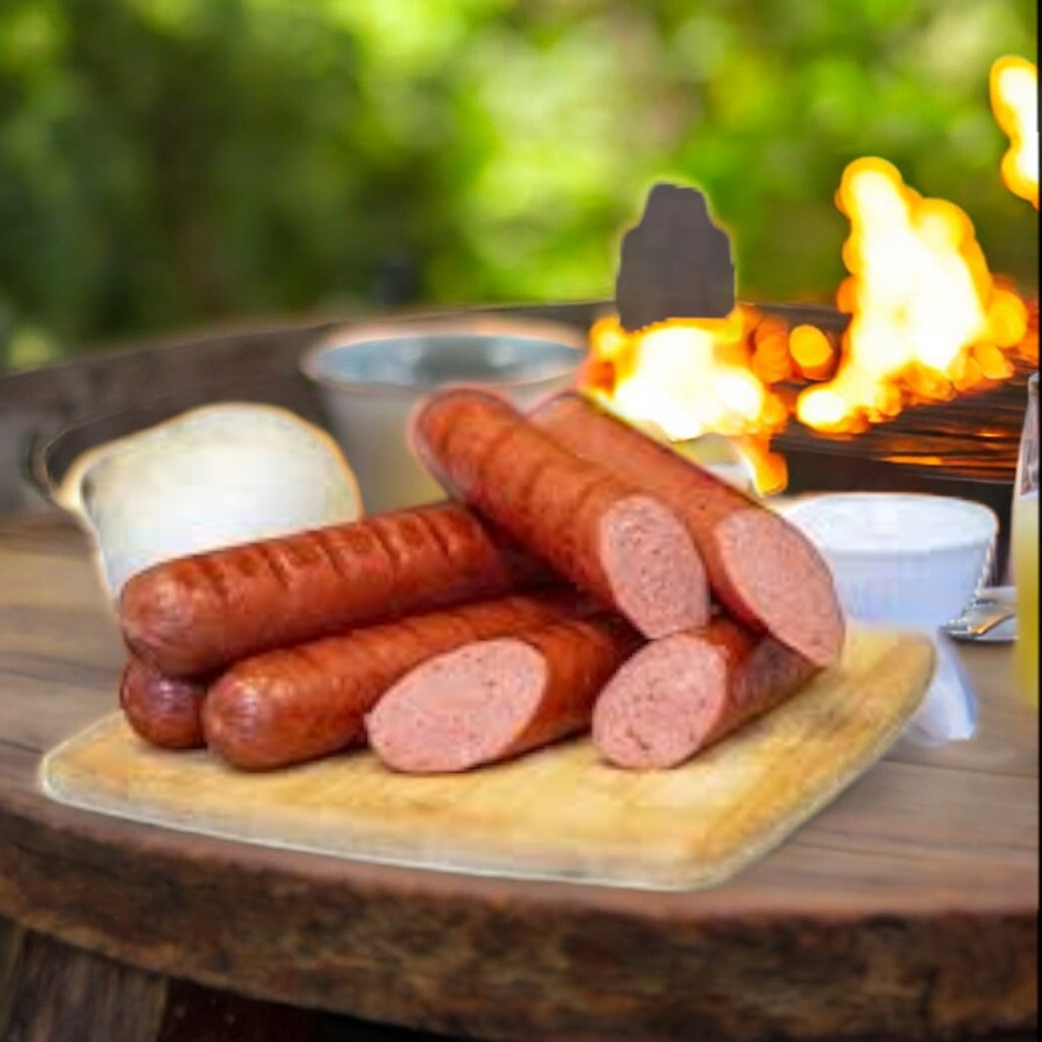 Ditka Hot Beef Polish Sausage by Vienna Beef on a wooden board with a bun, a bowl in the background, and flames on a distant grill.
