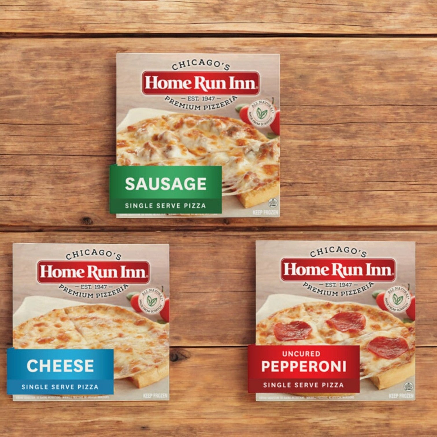 Three boxes of Home Run Inn Mini Personal Serving Sized Variety Pack with sausage, cheese, and uncured pepperoni pizzas crafted with quality ingredients for a delightful experience.