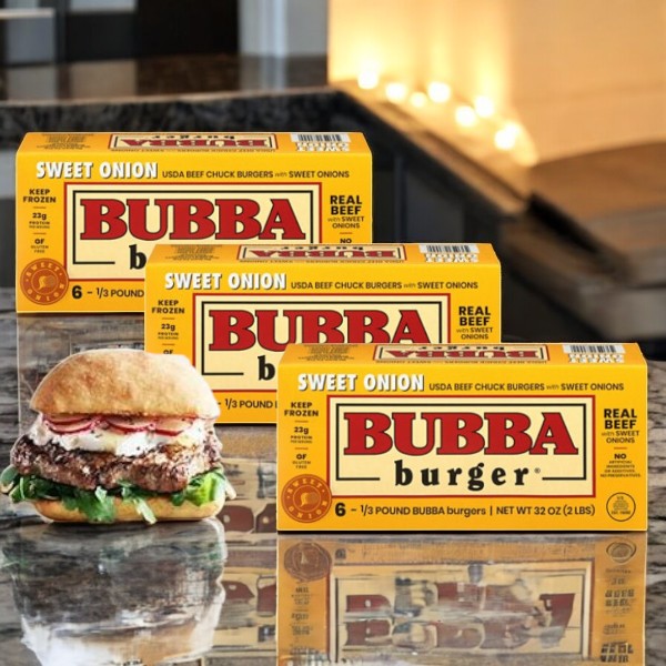 On the counter are three packs of Bubba Burger Beef Chuck, Sweet Onion, featuring a juicy beef patty in a bun upfront.