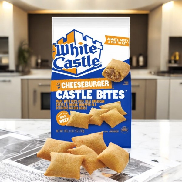 A bag of White Castle Cheeseburger Classic Bites- 1 Count sits on a kitchen counter, some bites scattered around to highlight their irresistible mini burger allure. Crafted with the iconic steamed cooking method for authentic White Castle taste in every bite.