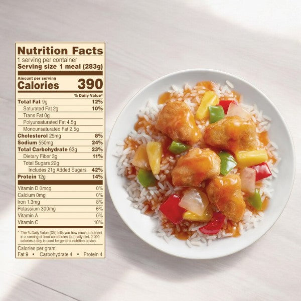 A plate of sweet and sour chicken with bell peppers and onions on rice sits beside a nutrition label showing just 390 calories per serving—ideal for nutritious choices from the College Meal Pack by Easy Lunches!.