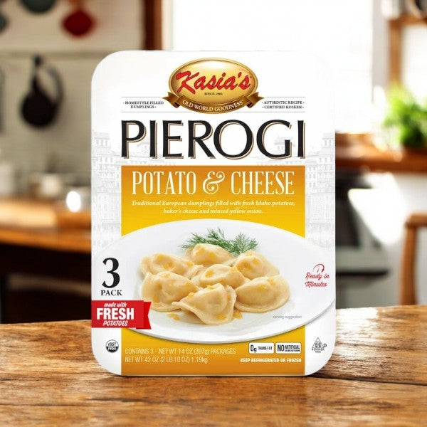 Kasia's Pierogi Potato & Cheese package features a tempting image of traditional dumplings garnished with dill, emphasizing the use of fresh potatoes for an authentic taste experience.