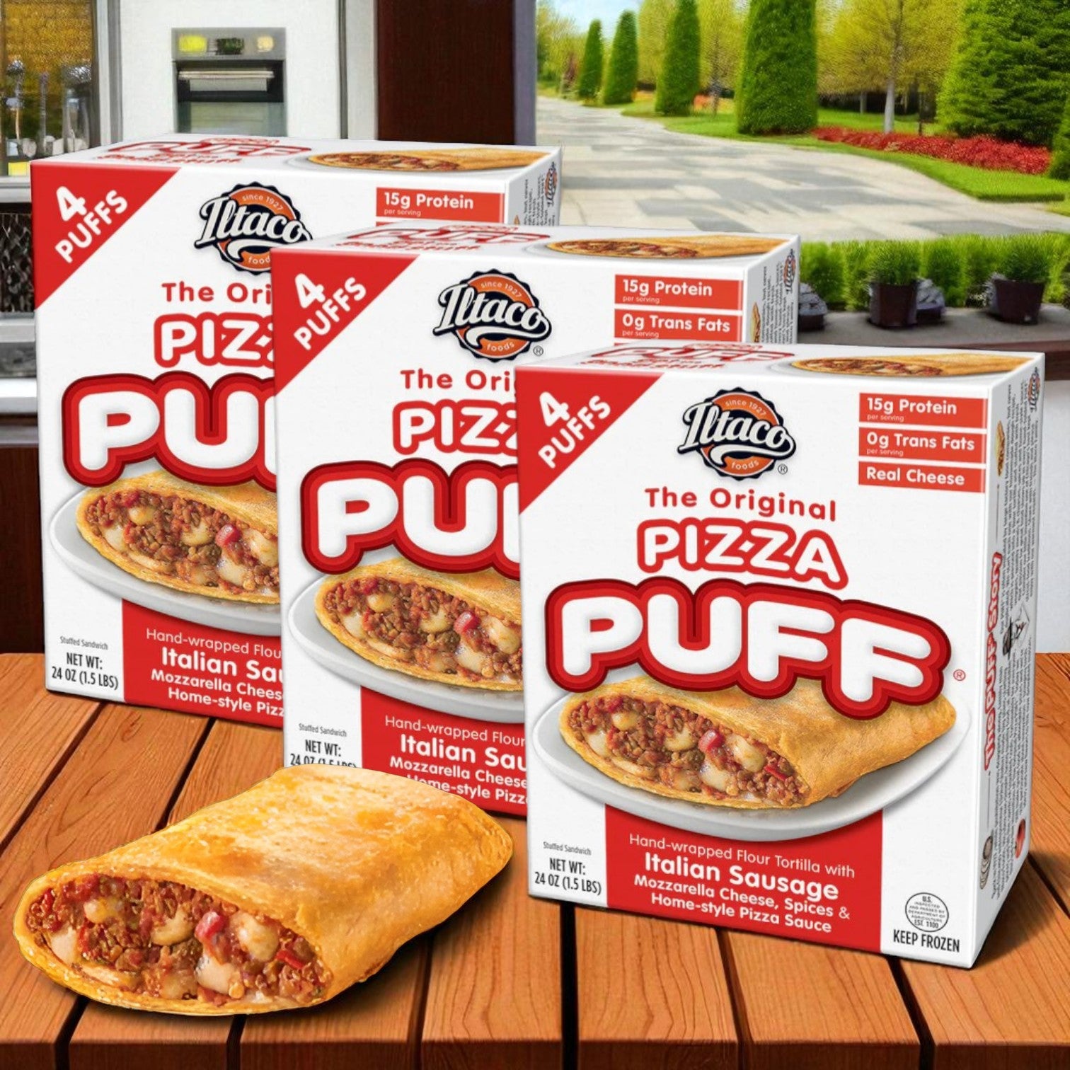 Three packs of Itaco Foods Original Pizza Puff - Sausage (4 puffs per pack, 24 oz) are displayed outdoors on a table, with one cooked pastry shown in front of the boxes.