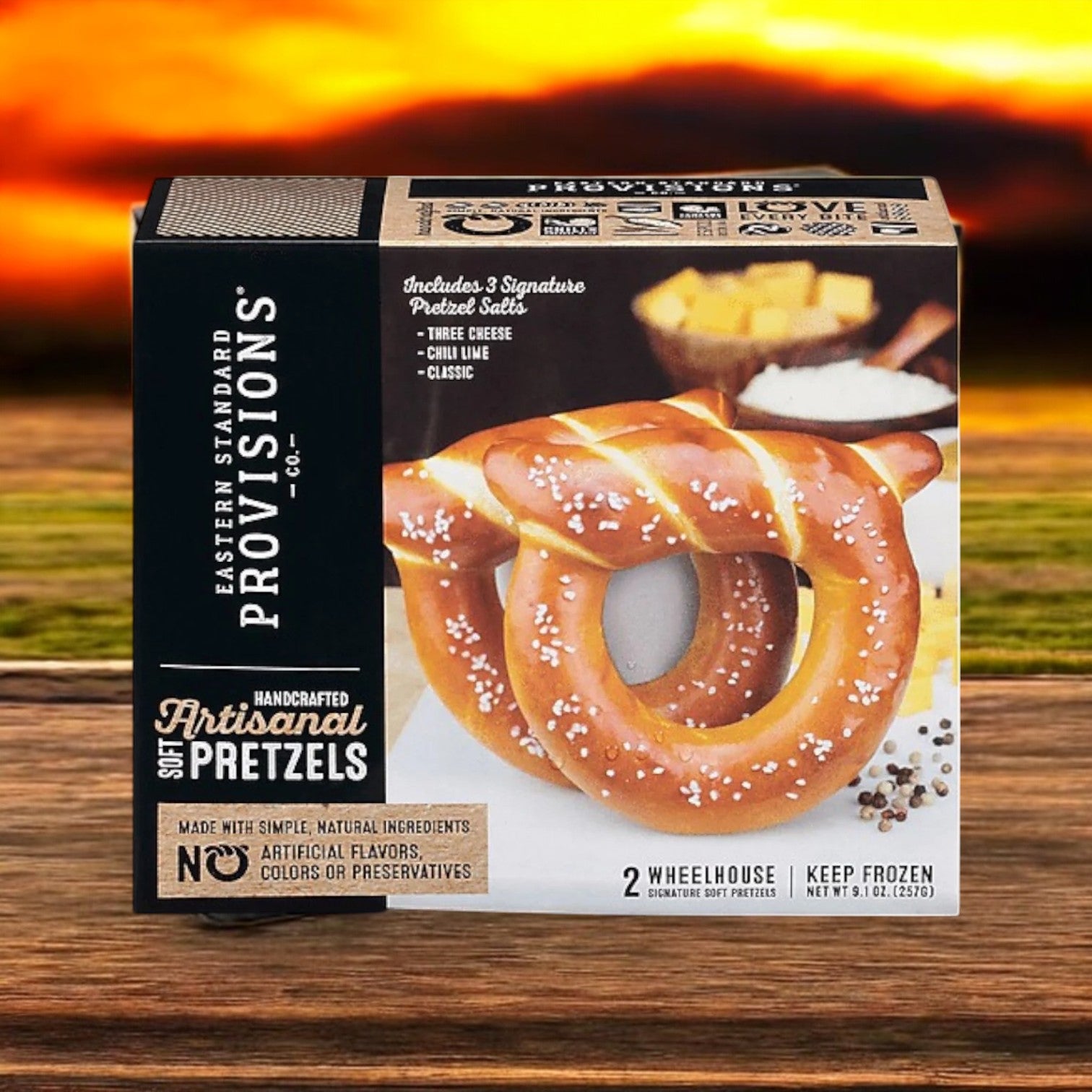The Eastern Standard Provisions Pretzel 3-Pack Combo features artisanal soft pretzels: two perfectly salted varieties plus three dipping salts—three cheese, chili lime, and classic.