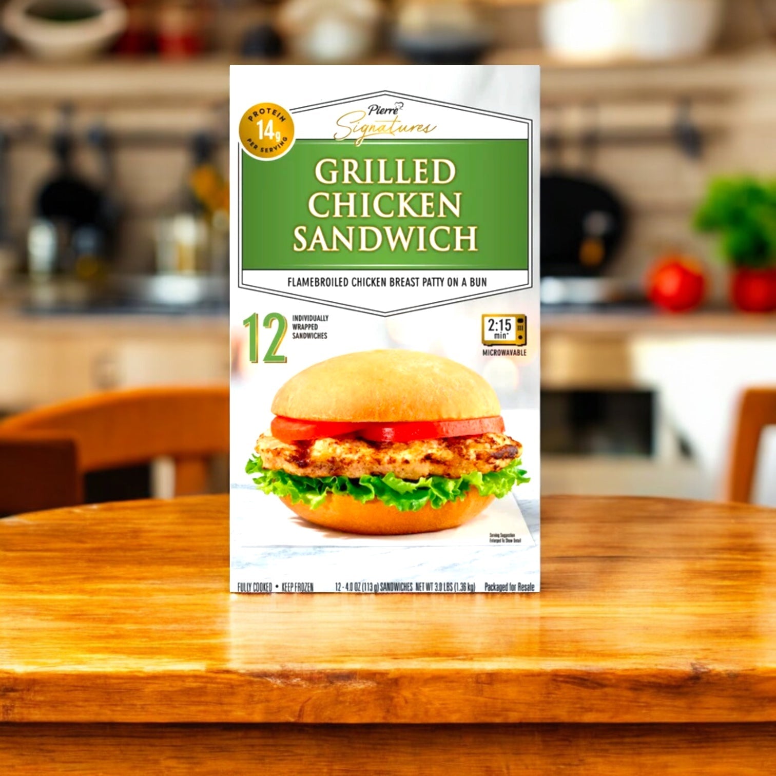 A box of Tyson's Pierre Signatures Grilled Chicken Sandwiches, 12 Count, is on the counter, featuring a sandwich with lettuce and tomatoes. This meal offers a quick microwave cooking time for easy preparation.