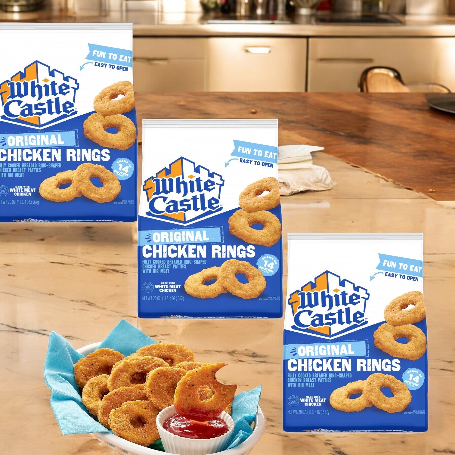 A kitchen counter showcases a basket and boxes of White Castle Original Chicken Rings, 20oz, 3 Count—the perfect frozen snack.
