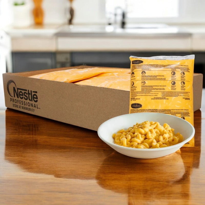 A family-sized meal awaits, featuring Stouffer's Entree Macaroni And Cheese Pouch (80 oz. - 1 Case, 4 Pack), perfect for cozy dinners reminiscent of homemade-style lasagna nights.